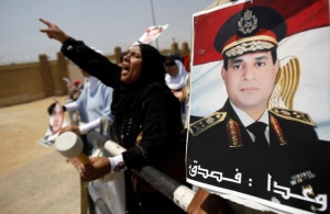 Supporters of Egypt's former President Mubarak shout slogans outside a police academy before Mubarak's trial in Cairo